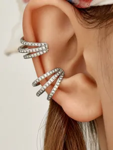 Detailed close-up shot of multi-layer pave rhinestone ear cuff, stylish and sparkling jewelry.