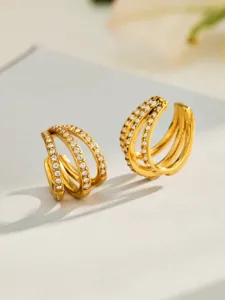 Close-up detail of 18k gold plated stainless steel multi-band pave crystal spiral ring.