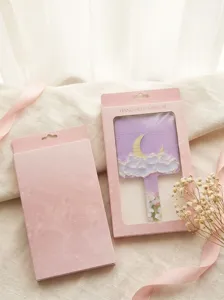 Handspiegel in prachtige roze geschenkdoos met venster, draagbare cosmetische accessoire.