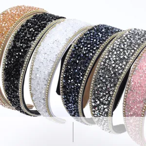 Detailed view of handmade crystal claw chain headbands in multiple gorgeous vibrant colors.