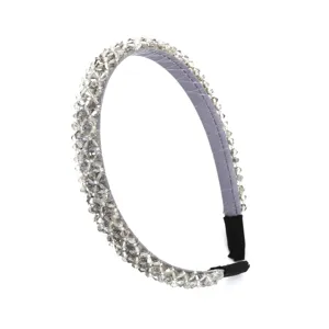 Close-up detail of sparkling rhinestone headband, grey fabric wrap, exquisite crystal beading.