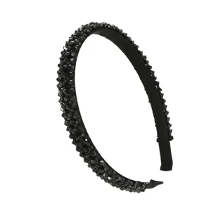 Detailed view of the exquisite black rhinestone beaded headband, showing intricate craftsmanship.