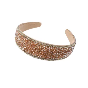 Elegant champagne crystal headband with sparkling rhinestones and claw chain design for women.