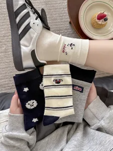 Cute cartoon sheep cotton mid-tube socks for women, stylish stripe design, comfortable fit.