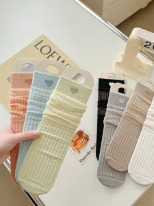 Cute ruffled women socks with heart embroidery, breathable mesh design for spring and summer.