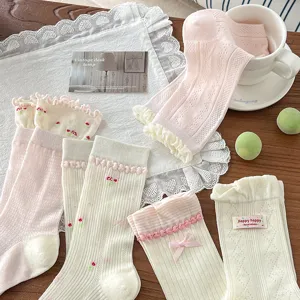 Sweet Korean style women mid-tube socks with cute bows, lace ruffles and floral embroidery.