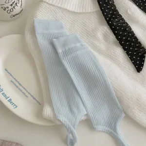 Detailed view of light blue stirrup socks with ribbed texture, elegant ballet style for summer.