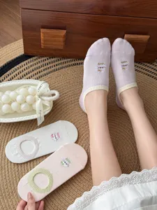 Detailed view of cute low-cut boat socks with sweet cat embroidery and breathable cotton fabric.