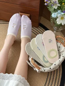 Detail view of summer low-cut invisible socks featuring cute cat embroidery and anti-slip heel.