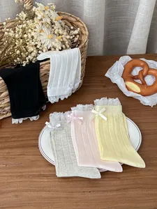 Sweet bow mesh mid-tube socks for women, breathable thin cute style spring summer wear.