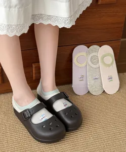 Detail view of Japanese style bow low-cut invisible thin summer cotton socks for women.