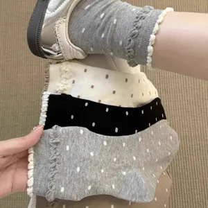 Chaussettes mi-hautes rétro à pois pour femmes japonaises mignonnes avec bordure en dentelle.