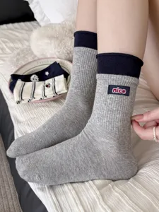 Autumn winter women grey ribbed mid-calf socks with cute nice embroidery daily wear detail.