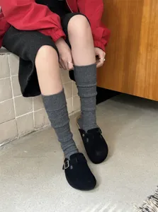 Knit slouchy high socks for women, warm winter knee-high ribbed hosiery in dark grey.