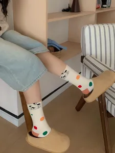 Cute cartoon animal pattern mid tube socks with colorful polka dots, soft cotton everyday wear.