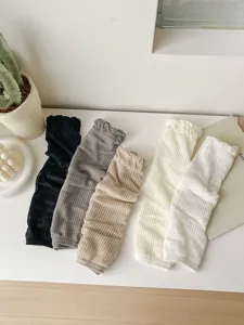 Detailed view of summer thin ribbed slouchy socks in multiple versatile colors. Soft fabric.