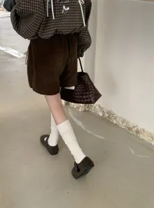 Knit wool high knee leg warmers for women, cozy winter thermal cable knit calf socks detail view.