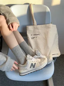 Grey cable knit mid-tube socks for women, cozy and stylish Korean aesthetic autumn hosiery.