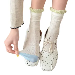 Sweet frilly mid-calf socks for women, cute knitted cotton hosiery showing detailed patterns.
