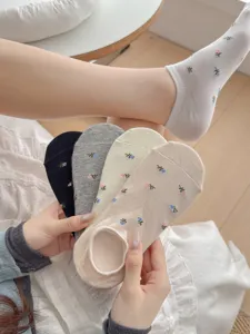 Detail view of cute floral low cut boat socks, breathable cotton invisible socks for women.