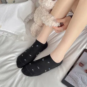 Black floral cotton ankle socks for women, cute low-cut boat socks with delicate embroidery.