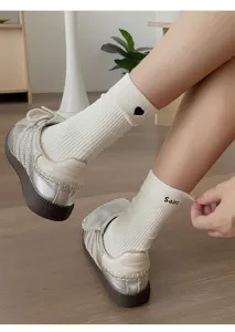 Korean style heart and letter embroidered mid-tube cotton socks for women, casual wear.