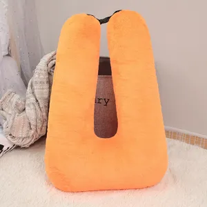 Orange plush U-shaped travel pillow soft neck cushion for car office and sleeping comfort