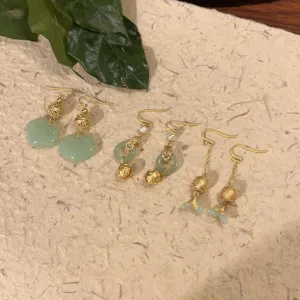 New Chinese style handmade green jade ruyi lock and fish tassel drop earrings for women.