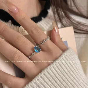 Oval blue gemstone and rhinestone dainty ring set, elegant minimalist jewelry for women.