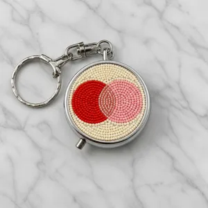 Porte-clés pilulier en métal perlé, accessoire de rangement portable à double cercle.