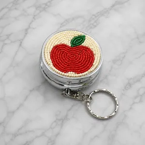 Boîte à pilules en métal pomme perlée porte-clés boîte de rangement portable détail vue