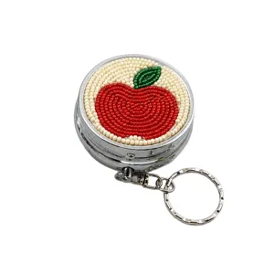 Porte-clés pilulier en métal perlé, mini boîte de rangement portable pomme rouge créative.