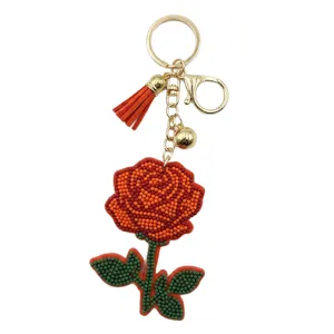 Porte-clés fleur de rose en perles avec pompon charmant sac pendentif anneau en métal chic