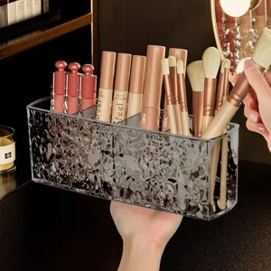 Clear acrylic cosmetic organizer with water ripple design, 4-grid desktop storage box.