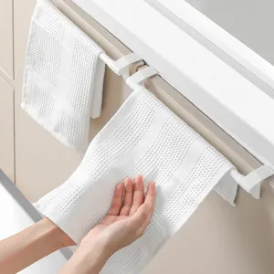 White cabinet door towel rack holder for kitchen bathroom organization, hanging dual bar.