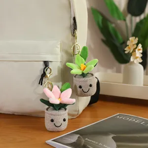Dettaglio portachiavi vaso di fiori giglio di peluche carosello borsa ciondolo morbido.