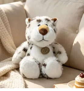 Cute plush toy detail shot, soft furry animal doll resting on a cozy beige sofa. Perfect gift.