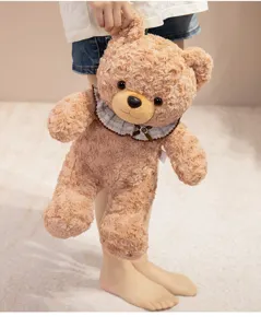 Cute plush teddy bear doll with nice bib, soft stuffed animal toy for kids cozy companion.