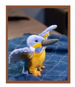 Cute kingfisher plush toy detail view, soft blue bird stuffed doll for kids and birthday gifts.