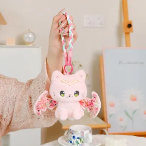Cute bat cat plush toy keychain, pink stuffed animal bag pendant with braided strap for women.