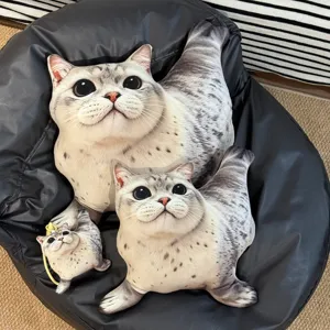 Cute 3D printed seal cat plush pillow and keychain detail showcasing realistic facial view.