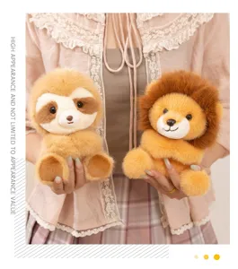 Close-up of cute sloth and lion plush toys with magnetic hug design and soft fluffy texture.