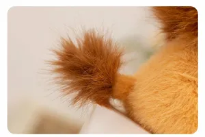 Close-up view of fluffy plush toy tail, featuring soft texture for kid companion.