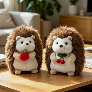 Cute and adorable hedgehog plush toy holding apple and cherry, soft stuffed animal doll.