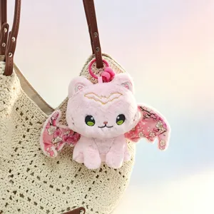 Cute pink bat cat plush toy keychain charm, soft stuffed animal bag pendant for women and girls.