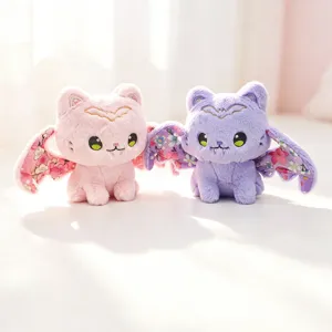 Cute pastel bat cat plush toy set, soft stuffed animal doll with cherry blossom wings decor.
