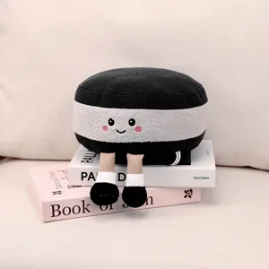 Lindo peluche en blanco y negro con piernas colgantes, suave muñeca como regalo de cumpleaños.