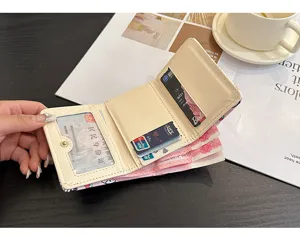 Compact trifold women wallet with multiple card slots and ID window, premium design.