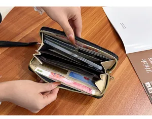 Black quilted long wallet for women, large capacity zipper clutch purse with multiple card slots.