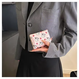 Cute pink trifold short wallet for women, featuring a sweet cow and strawberry pattern.